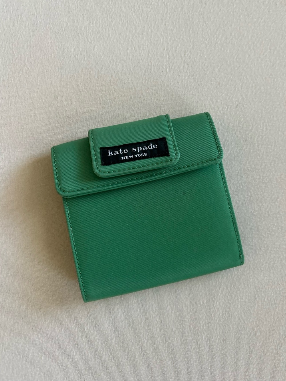 kate spade vintage green mini bifold wallet